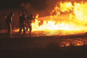 firefighters battle flames from a gas explosion