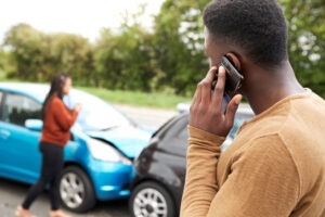 A man calls a car accident lawyer after being involved in a crash caused by the other driver.