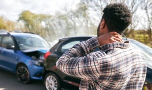 A car crash survivor shows early symptoms of whiplash.