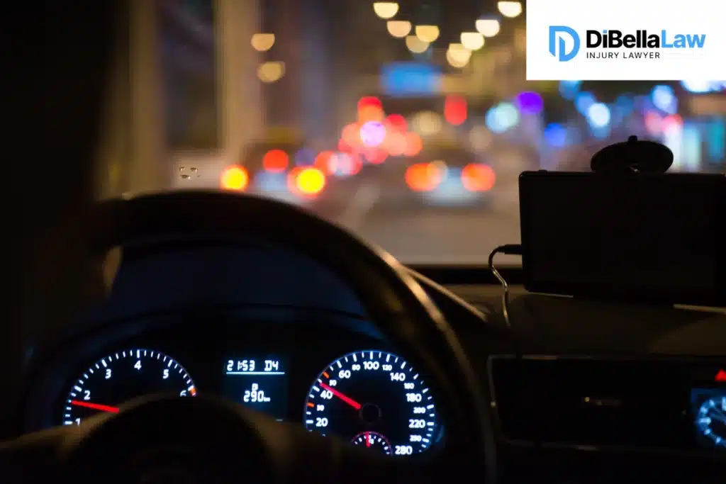 A car driving at night with a blurry effect.