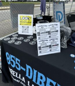DiBella Law Motors booth signs and giveaways