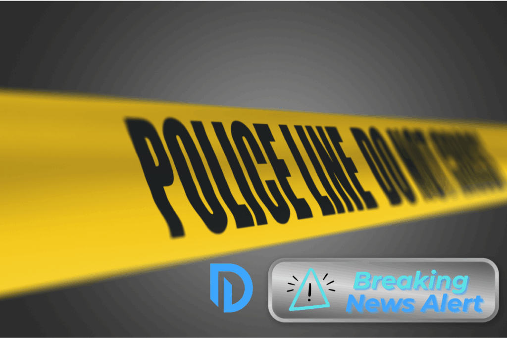 Police tape showing Do Not Cross on a gray background