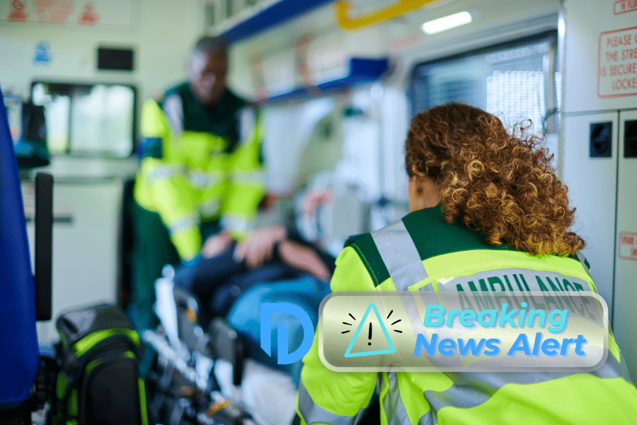 patient injured in an industrial accident is taken to the hospital in an ambulance