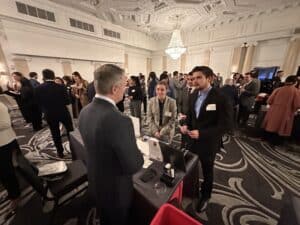 Chris DiBella speaking with young law student