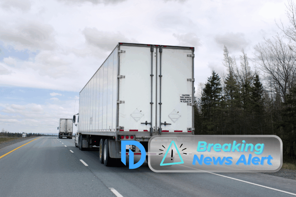 the back of a semi trailer on the Massachusetts turnpike