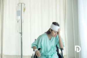 woman in hospital because of a bad fall with her head injury wrapped