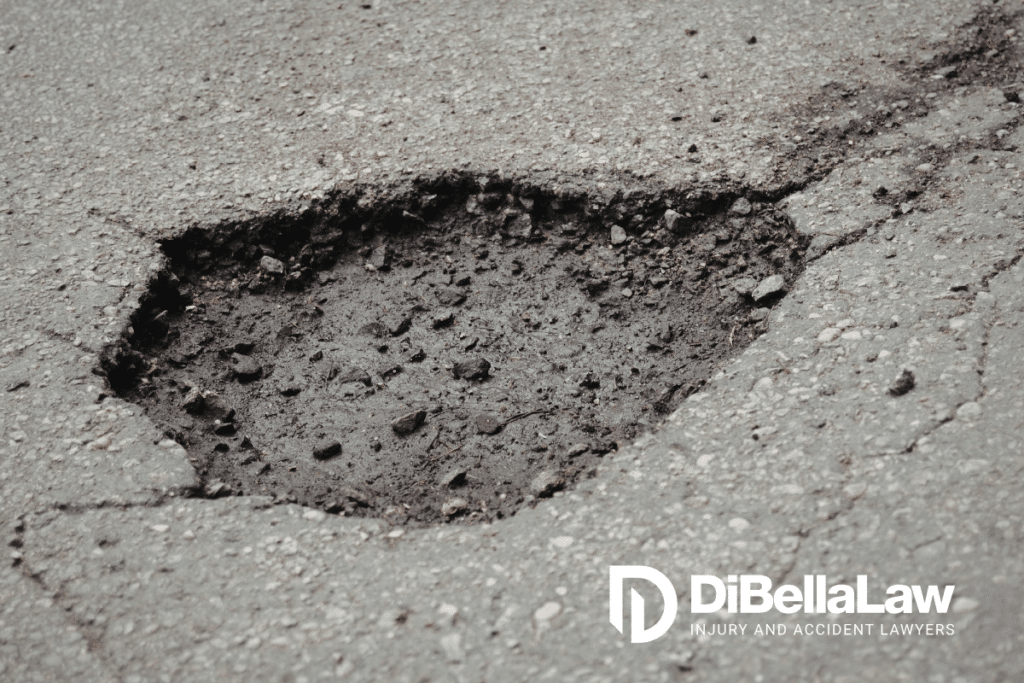 Can I Sue the City of Boston for a Pothole Car Accident. Image of a deep pothole
