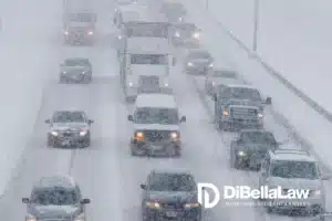 an image of highway traffic during a snowstorm