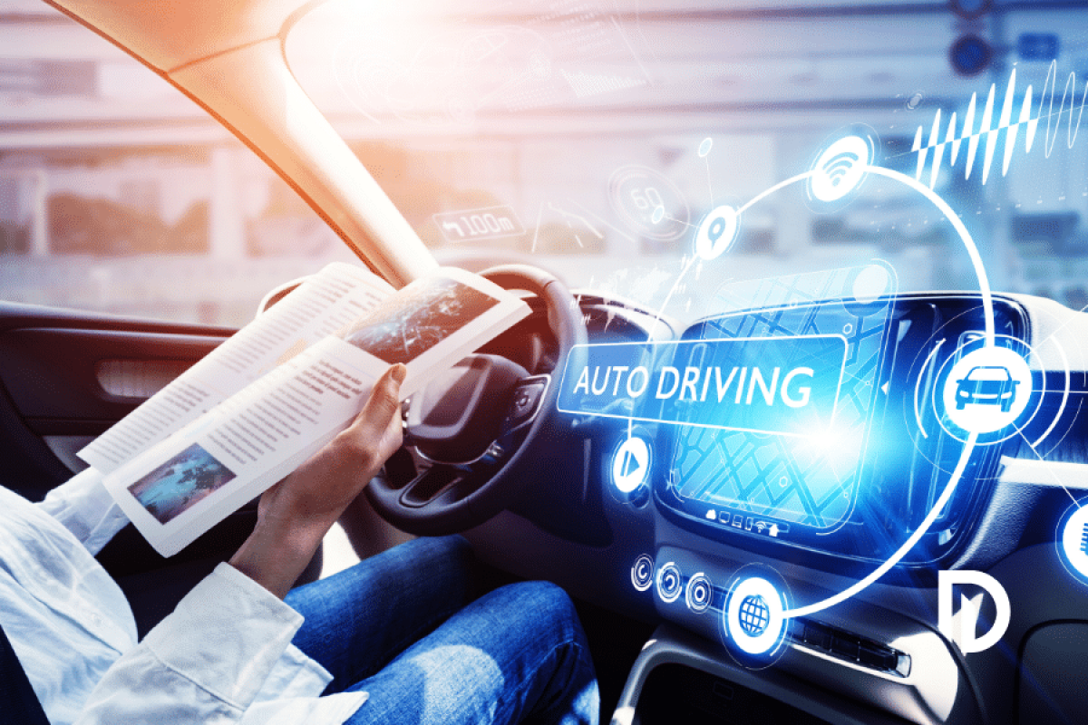 woman sitting in the drivers seat of a car, reading, while the automated car drives itself