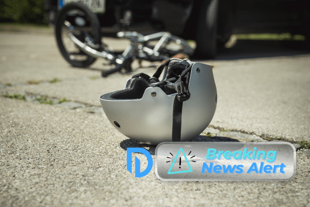 helmet on the road, after an e-bike accident