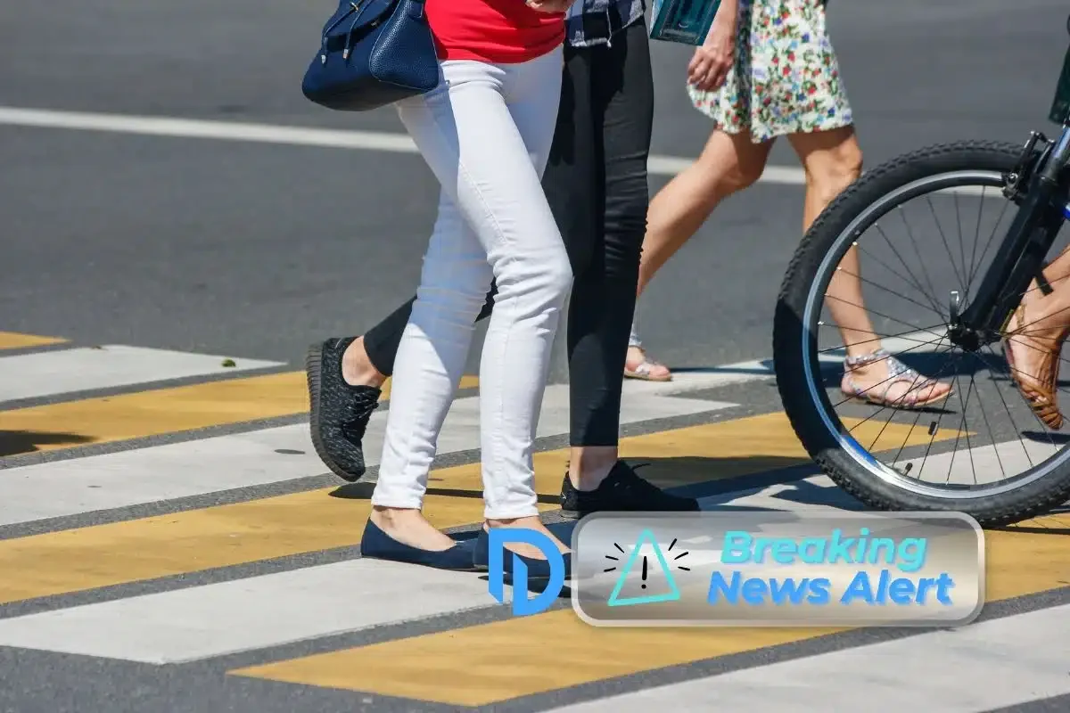 people crossing the street, closeup of crosswalk in Brookline, MA