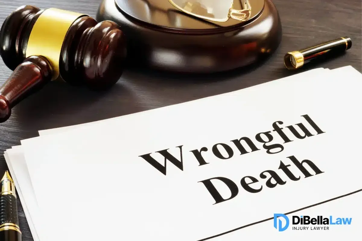 A wrongful death report and gavel placed on a table.